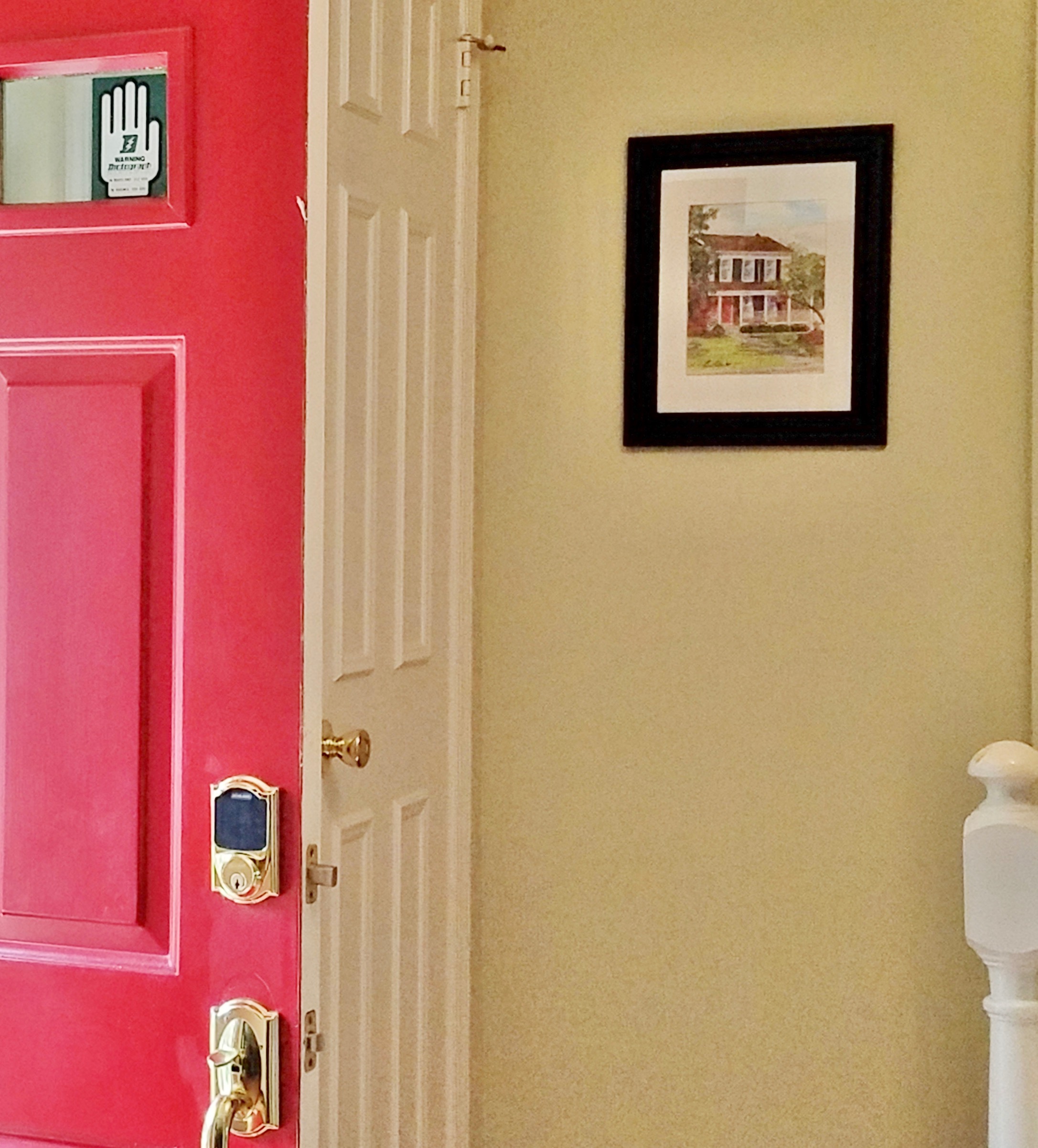 My Chevy Chase MD client hangs her house portrait by the front door.