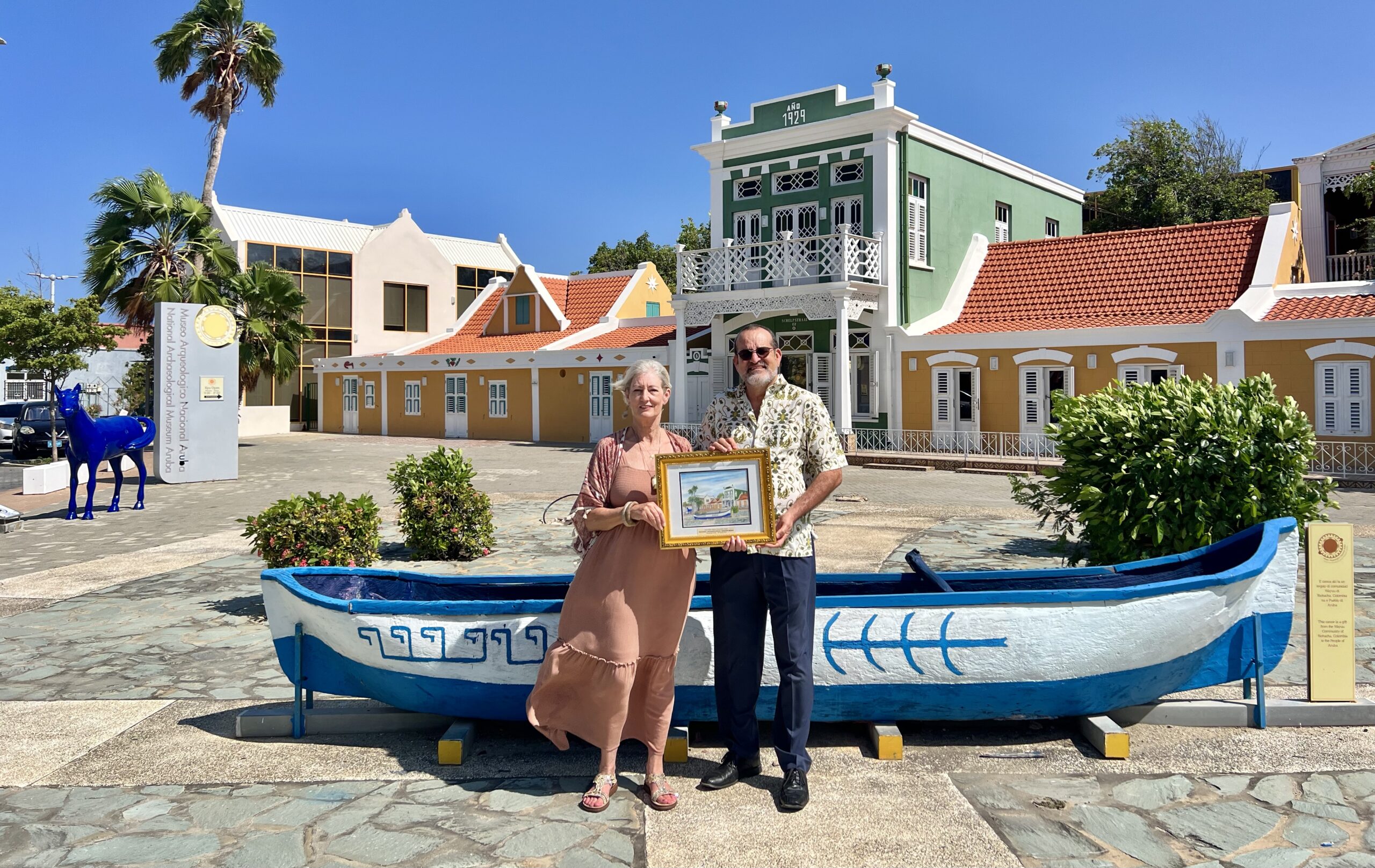 Leisa Collins and Panch Geerman standing in front of the National Archaeological Museum in Aruba
